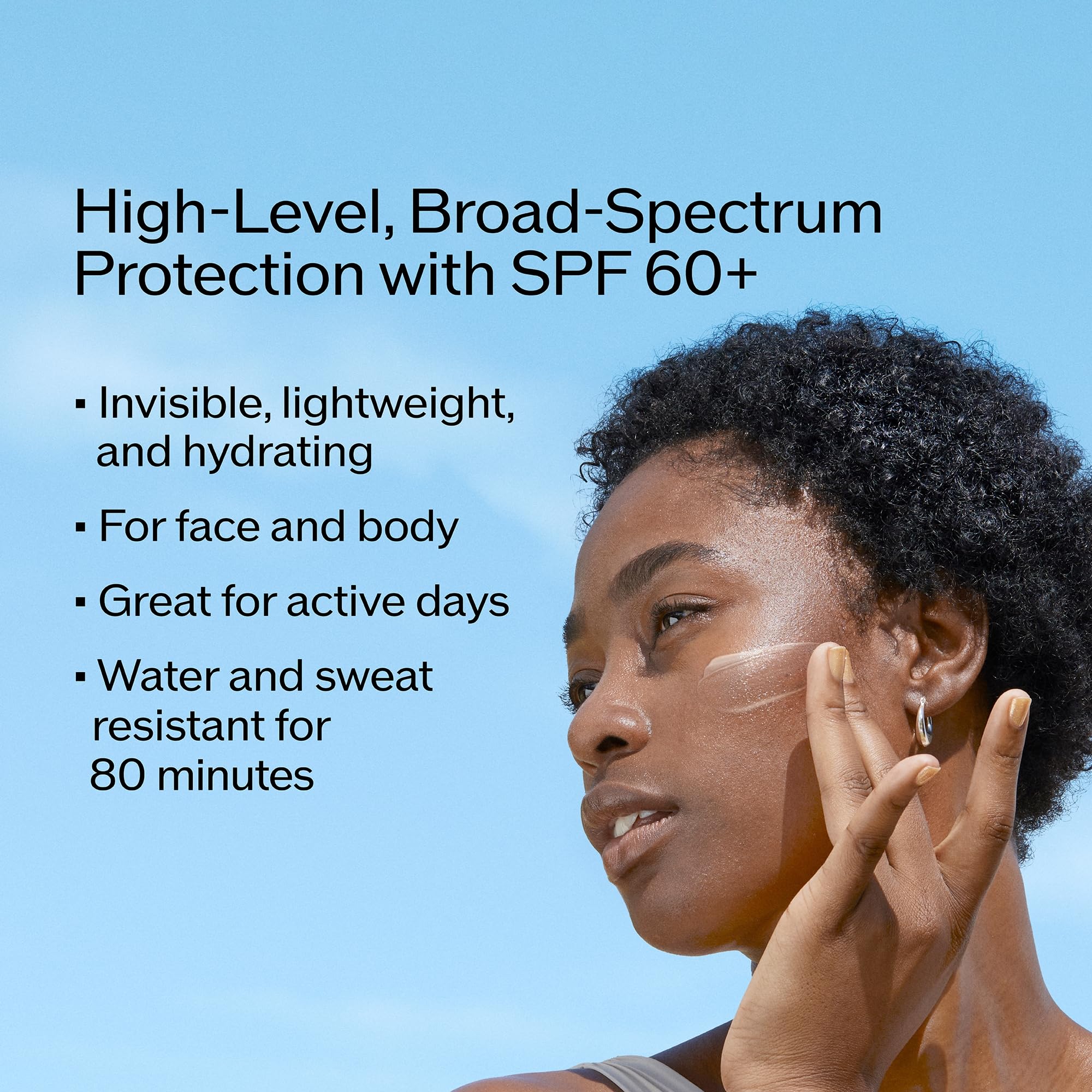 Shiseido SPF 60+ bottle held in hand for outdoor use