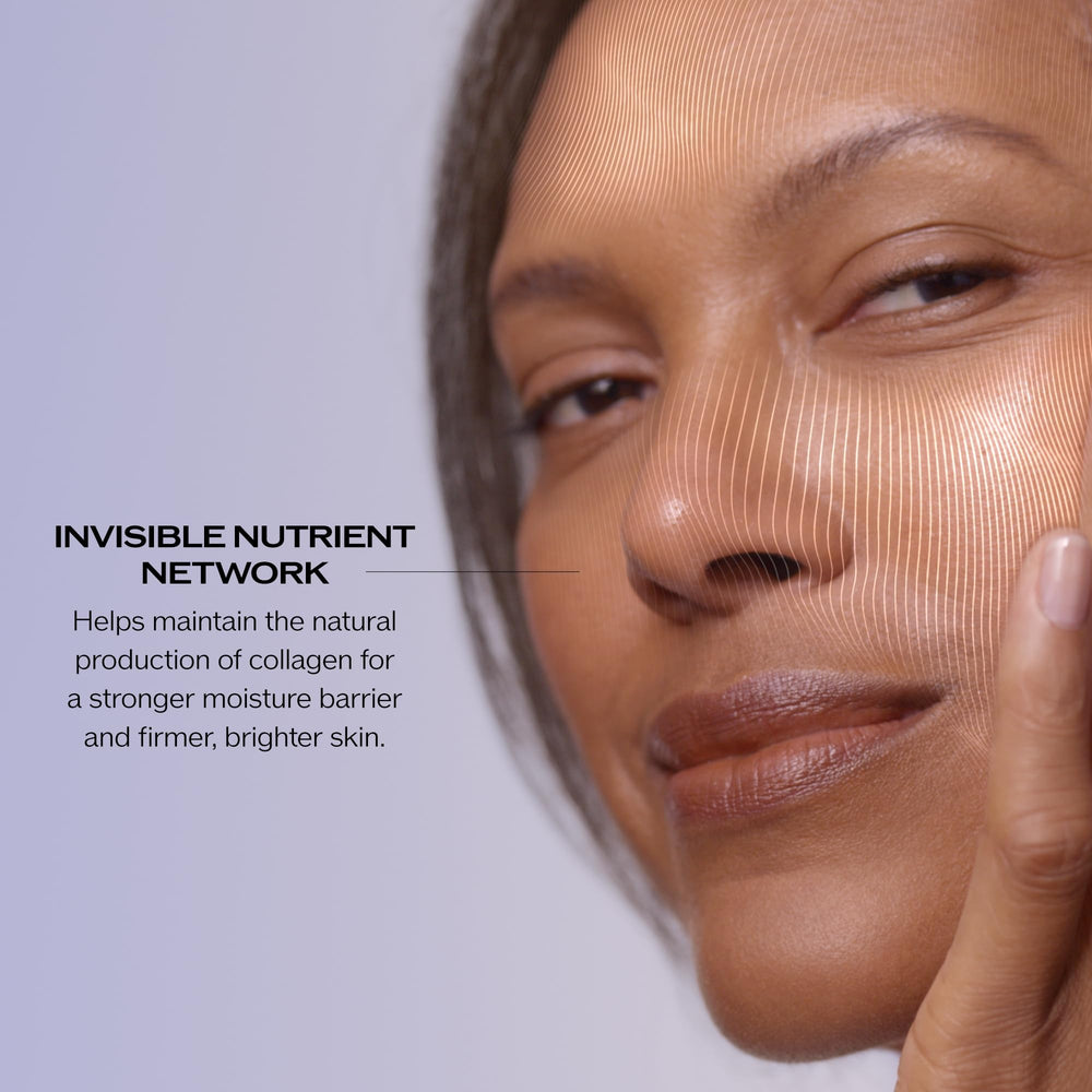 Cheek and forehead motion demonstrates lifting, firming motion with the cream.