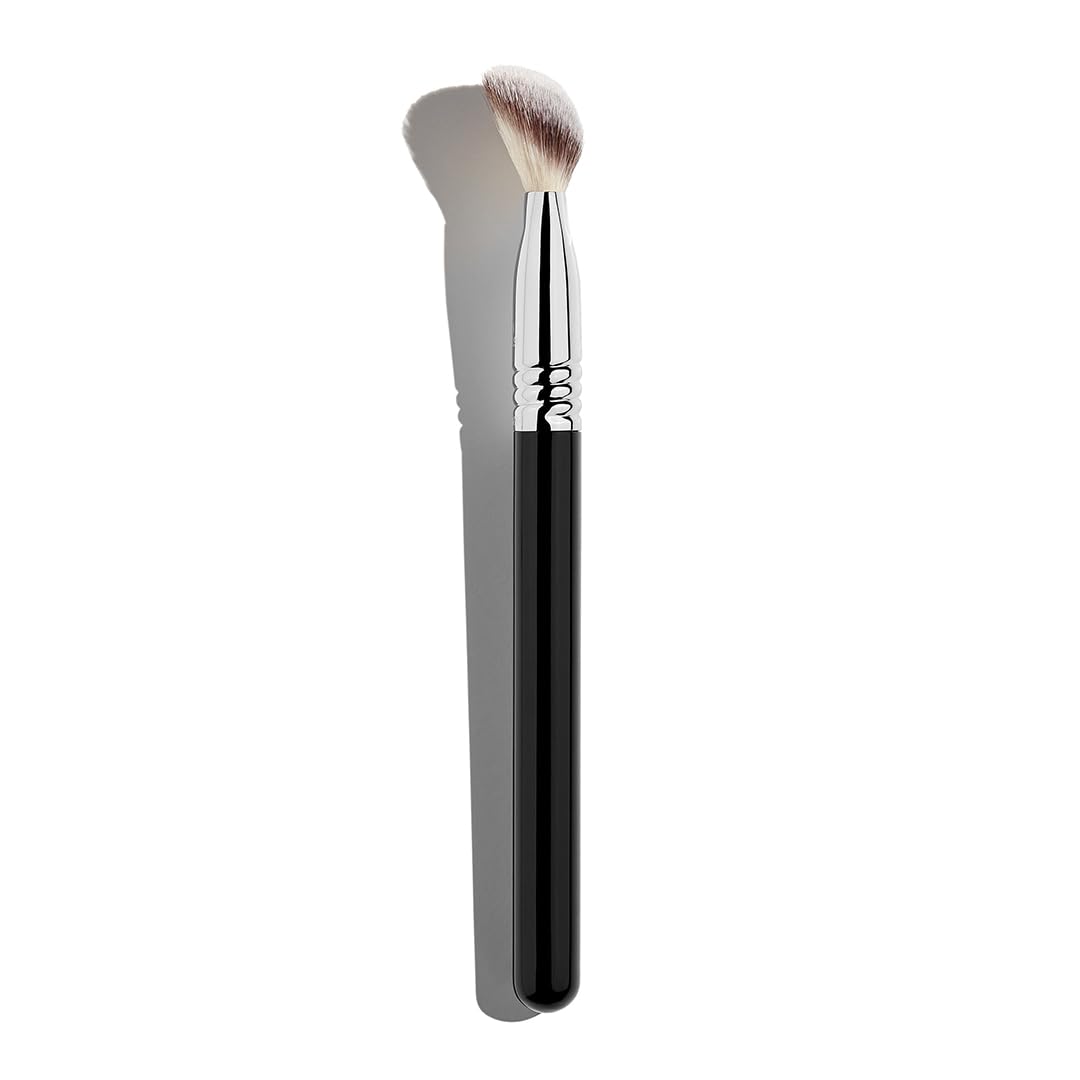 Sigma Beauty F08 precision powder brush with ergonomic handle for precise under-eye setting.