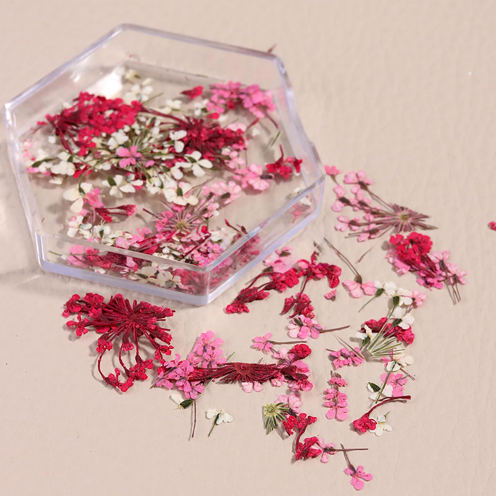 Dried flowers placed on a nail to show simple, elegant nail art