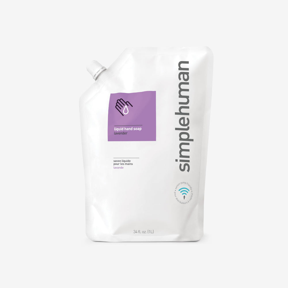 simplehuman lavender hand soap pump in action dispensing soap
