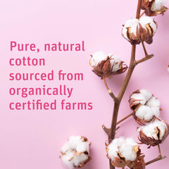 Simply Soft organic cotton rounds applying creams smoothly for even coverage.