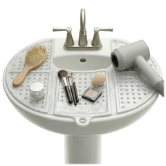 Sink Topper heat-resistant silicone mat protects surfaces from hot tools.