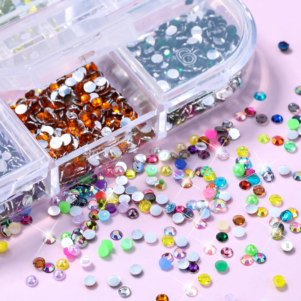 Picker pen and tweezers included with Sinyanail rhinestones kit
