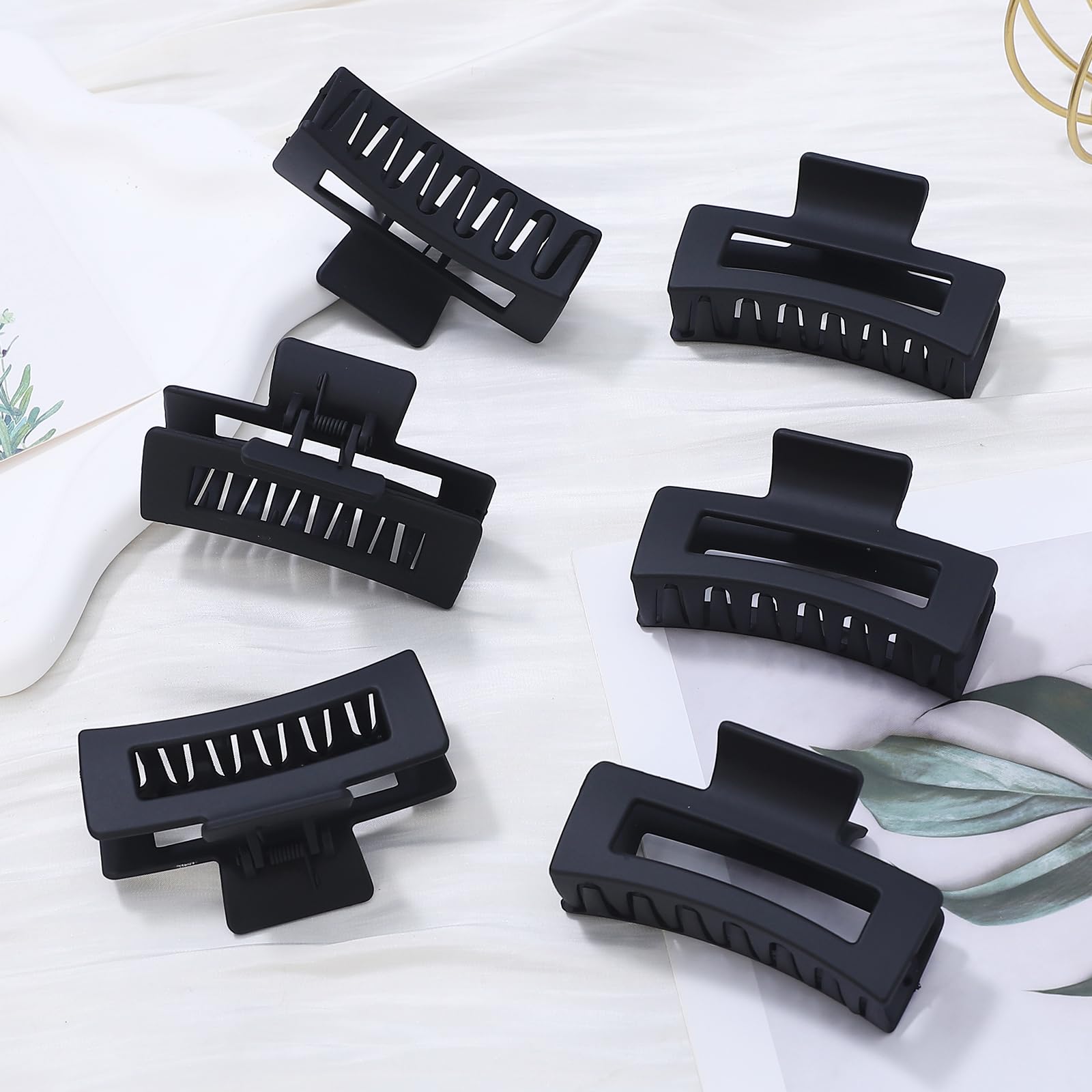 Sisiaipu clip rectangular negro, seis piezas para recogidos rápidos.