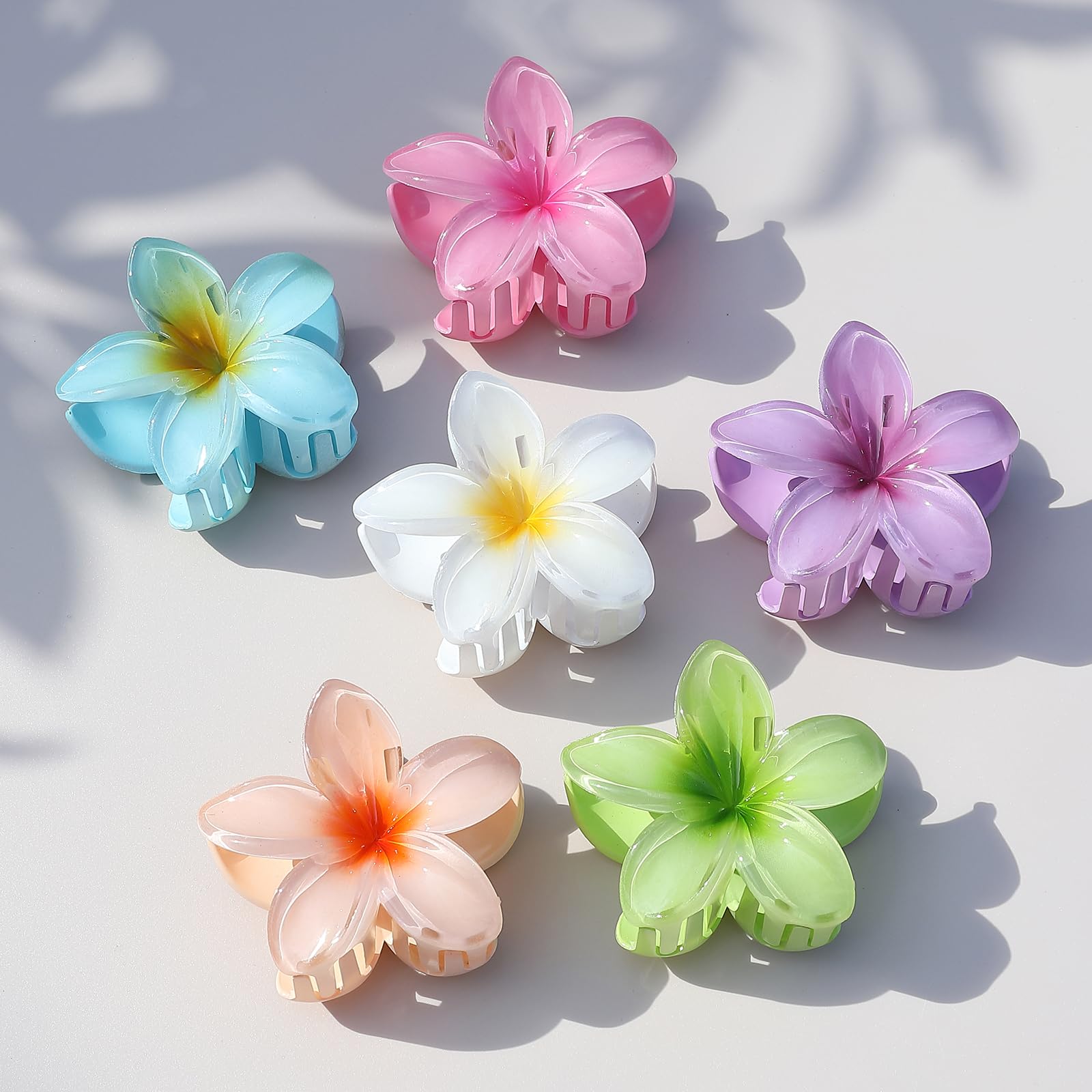 Sisiaipu clips flores plumeria medianas, ideales para cabellos gruesos o finos.