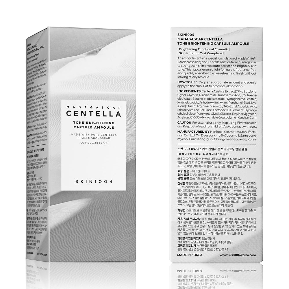 SKIN1004 empaque minimalista blanco para almacenamiento y uso práctico.
