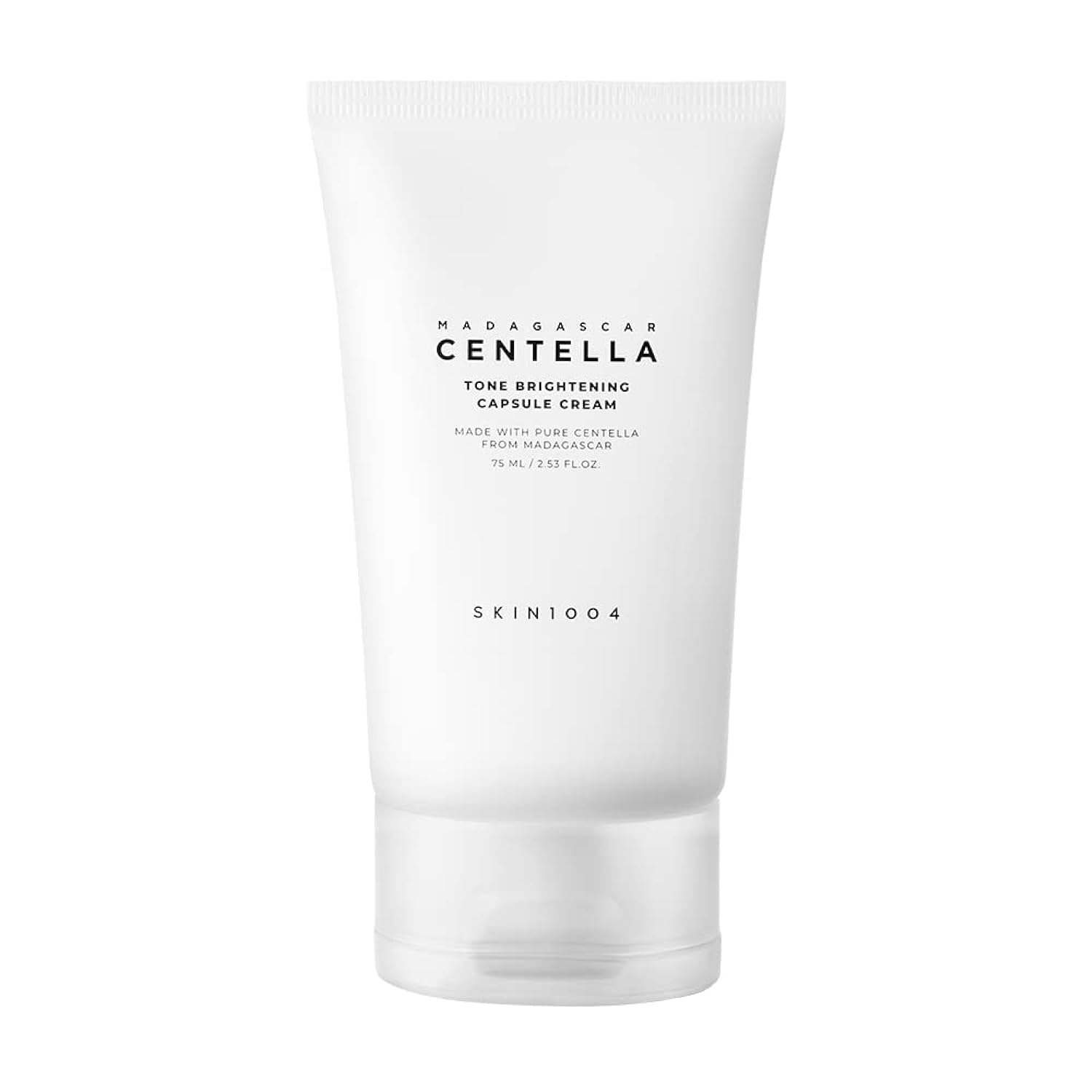 SKIN1004 Tono Brillo Capsula Crema, enfoque visual: textura suave que ilumina naturalmente.