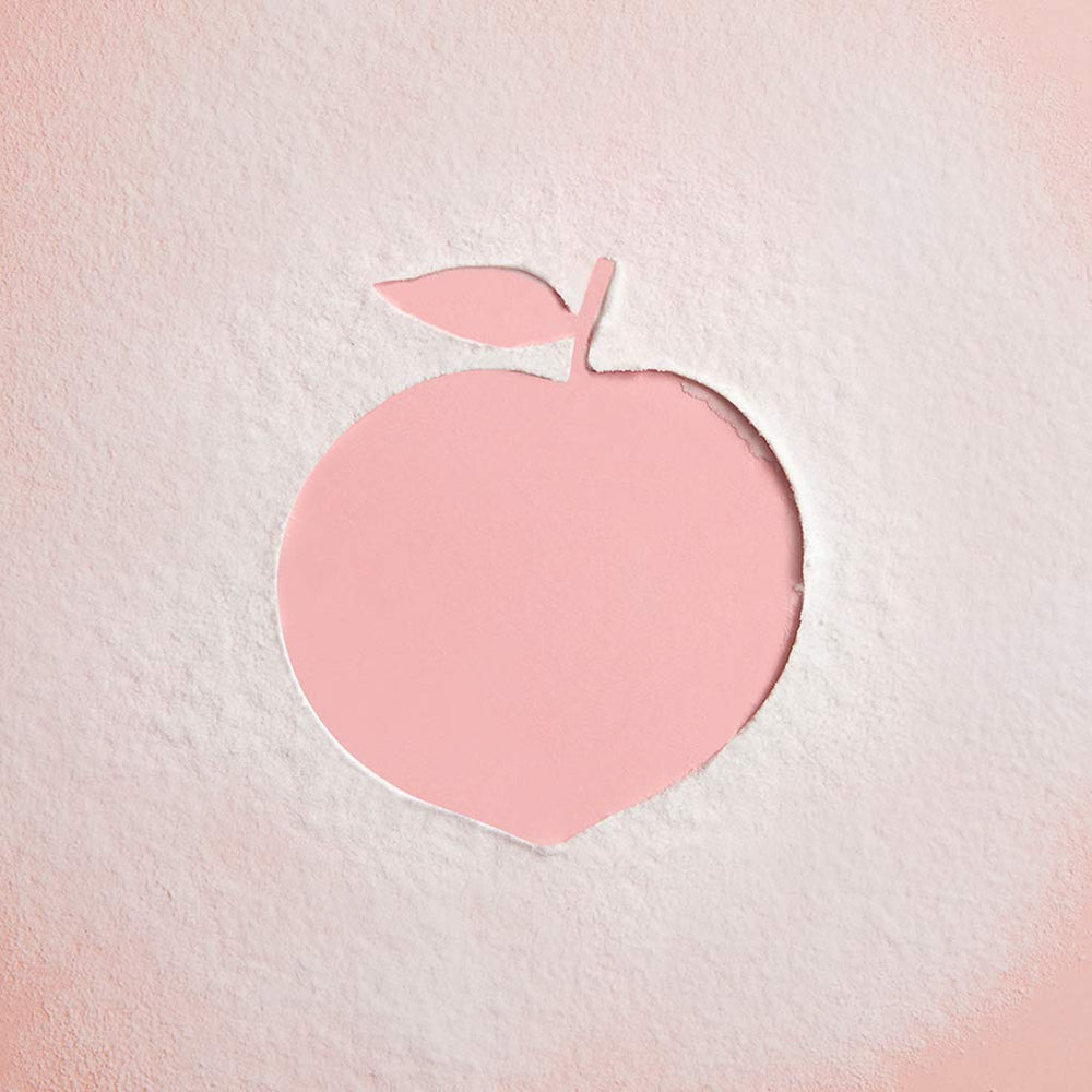 SKINFOOD 1957 Peach Cotton, envase compacto ideal para retoques discretos.
