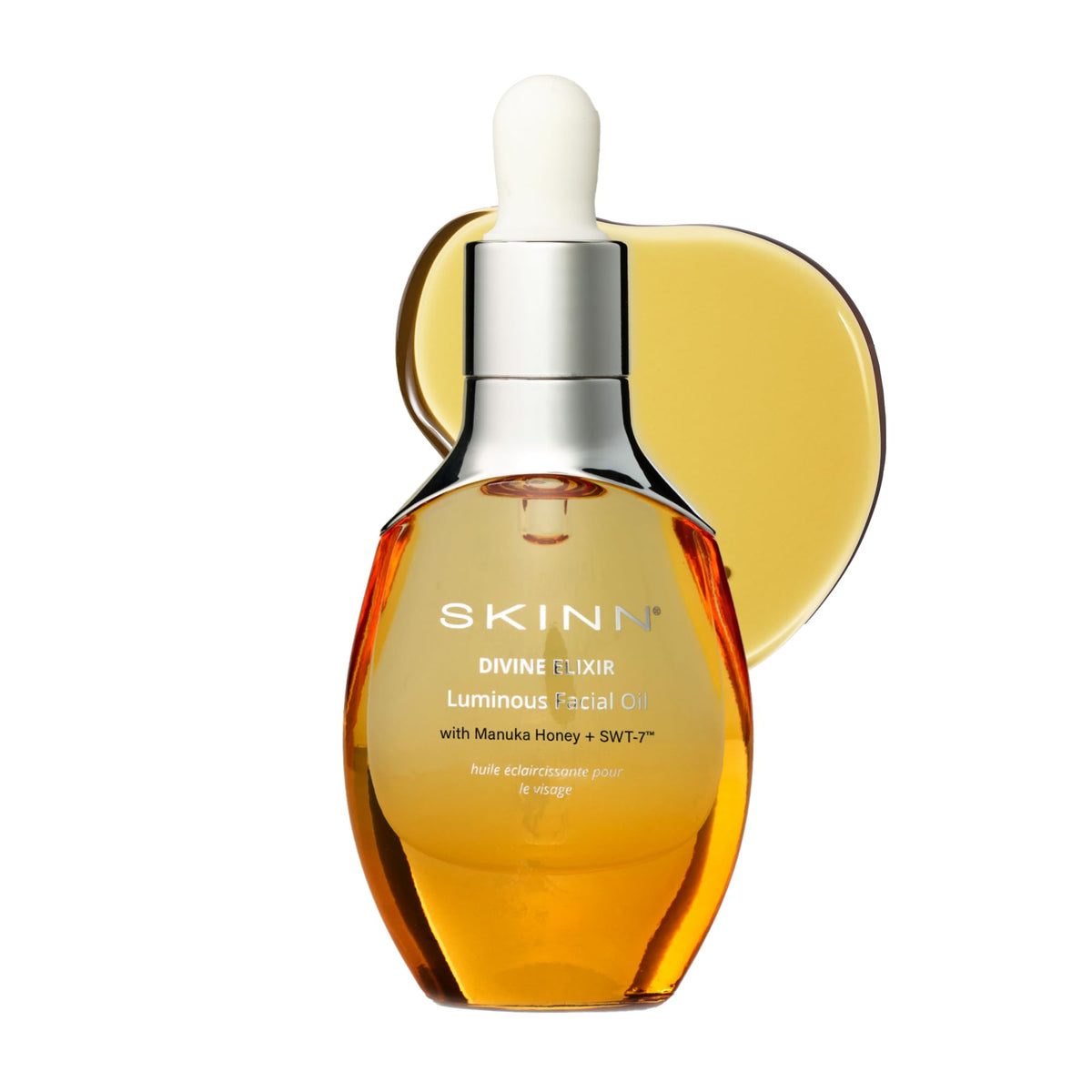 SKINN anti-aging luminous face oil bottle showing premium packaging and glow