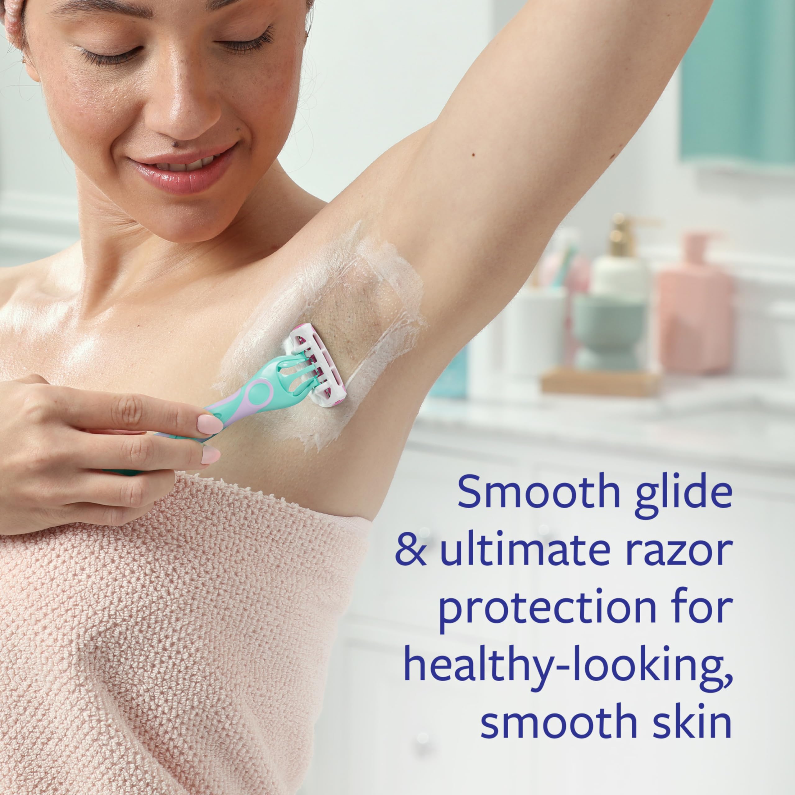 Skintimate Skin Therapy aloe and vitamin E moisturizing ingredients close-up.