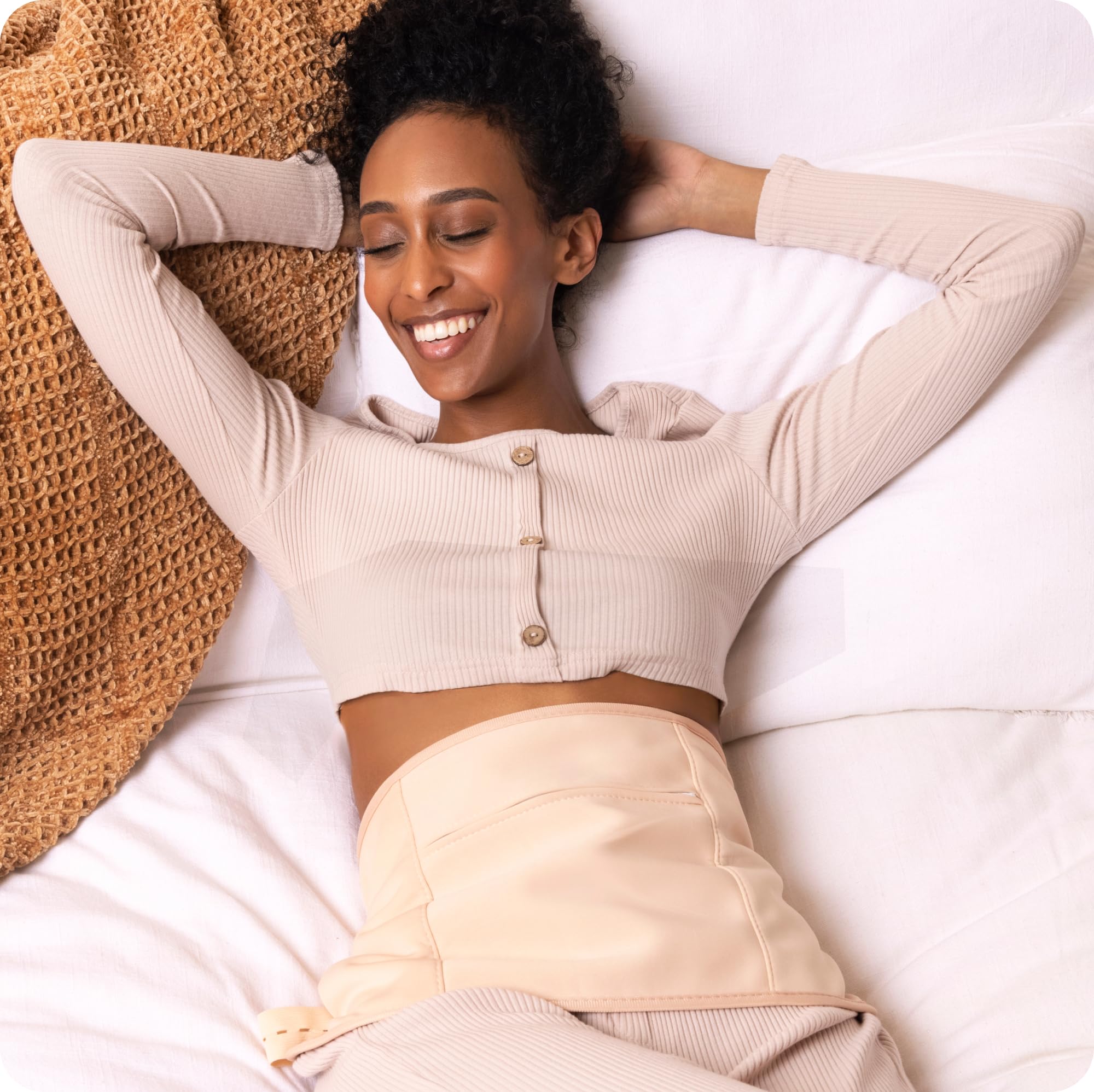 Sky Organics castor oil pack in use during rest for relaxation potential.