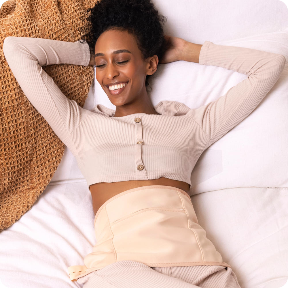 Sky Organics castor oil pack in use during rest for relaxation potential.