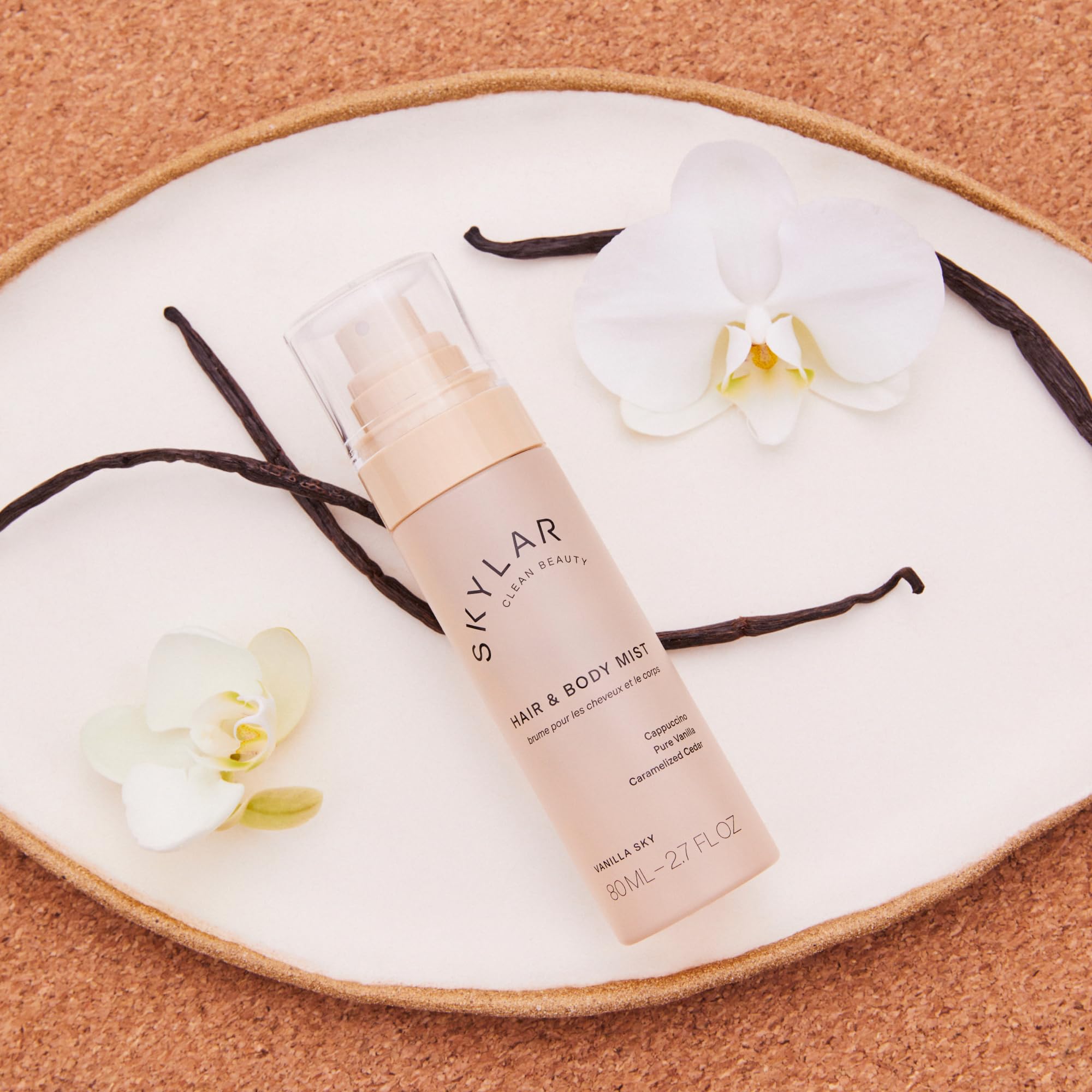 Skylar Vanilla Sky hair mist applied for a refreshed light scent.