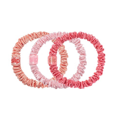 SLIP Skinny Scrunchies peach with gentle crease-free hold for delicate hair.