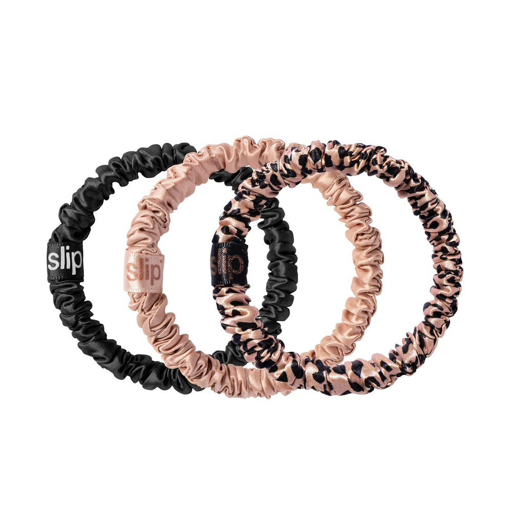 SLIPSILK skinny scrunchie in black close-up highlighting anti-crease finish.