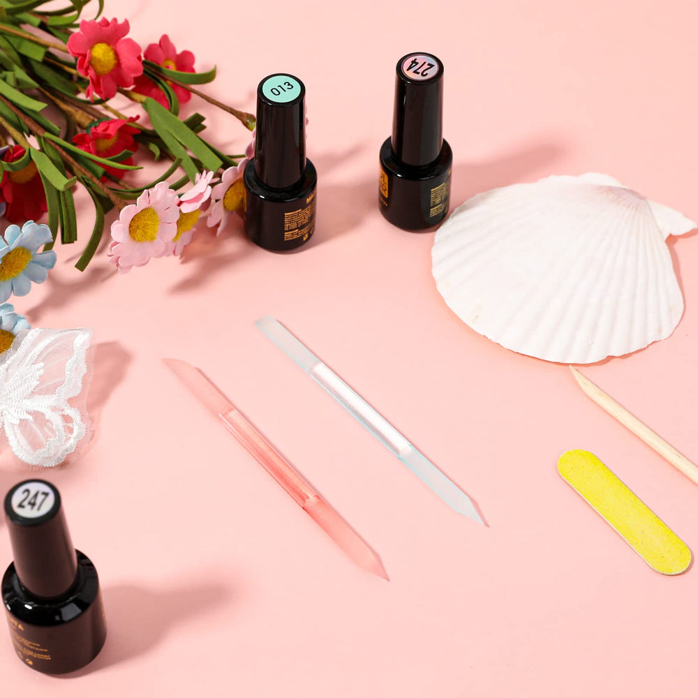 Sliverdew glass cuticle pusher in use on natural nails