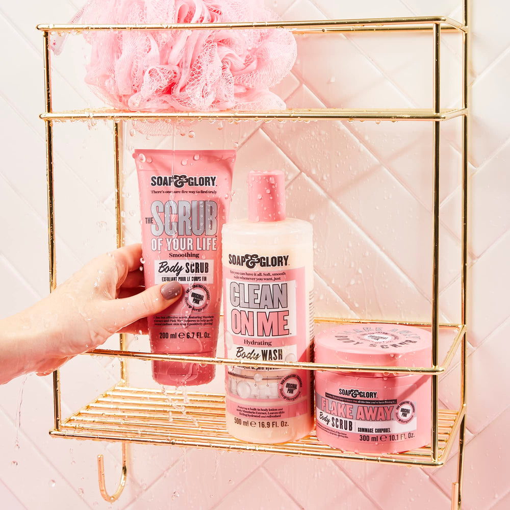 Fragrance swirls in Soap & Glory Original Pink Scrub jar with bergamot and rose notes.