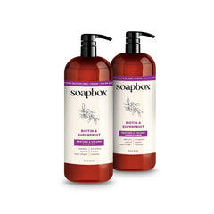 Soapbox Biotin and Superfruit Shampoo bottle pour for fuller-looking hair.