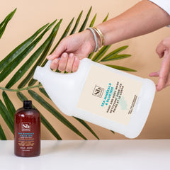 Soapbox Sea Minerals Blue Iris hand wash on hands with nourishing moisture.