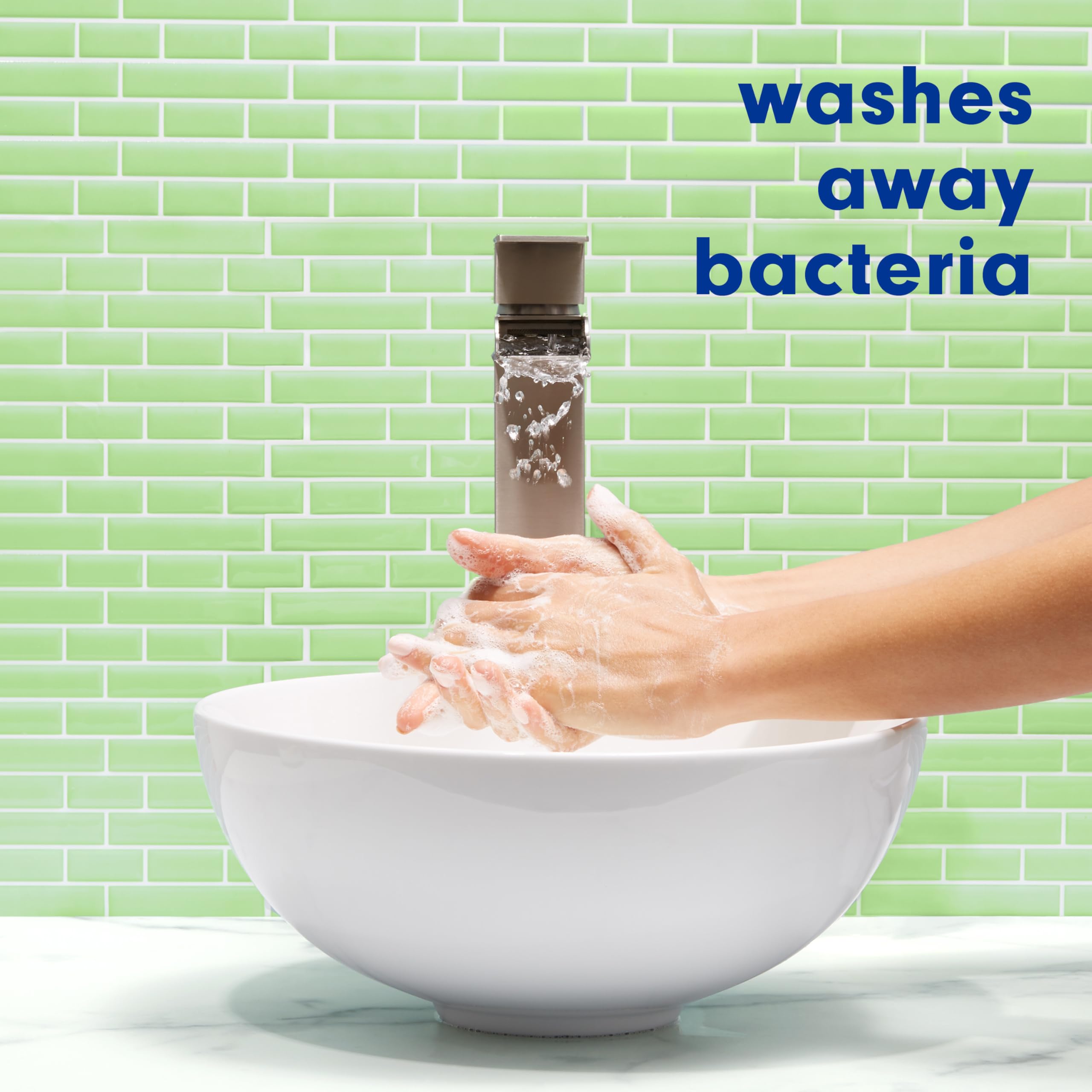 Lathered suds from Softsoap Fresh Citrus during handwashing