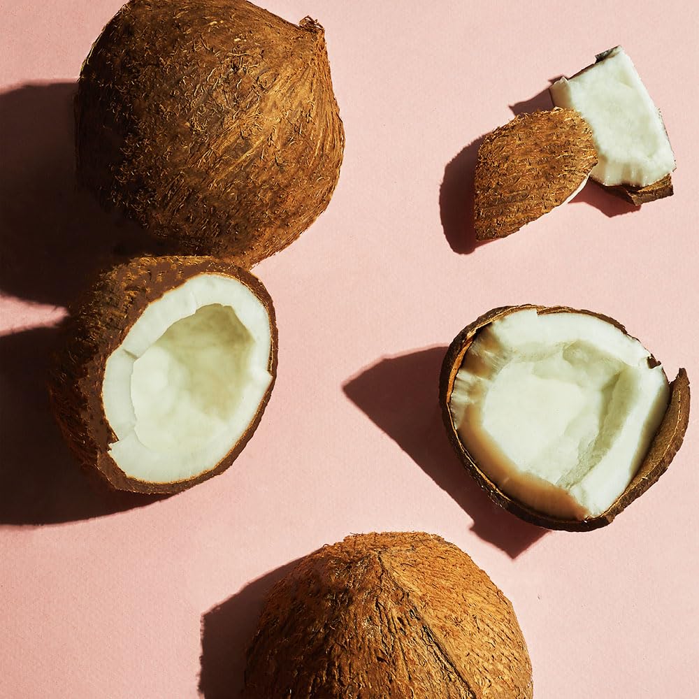 Softsoap coconut butter scrub label emphasizes a pH-balanced formulation.