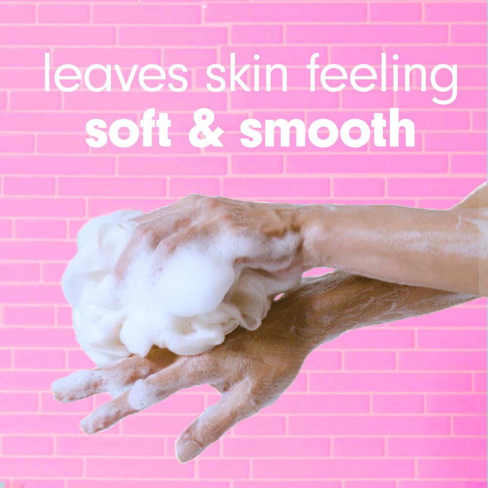 Softsoap Honeysuckle & Orange Burst bottle close-up with smooth moisturizing formula.