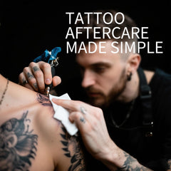 In-use SOKTH wipe cleansing skin during a tattoo procedure