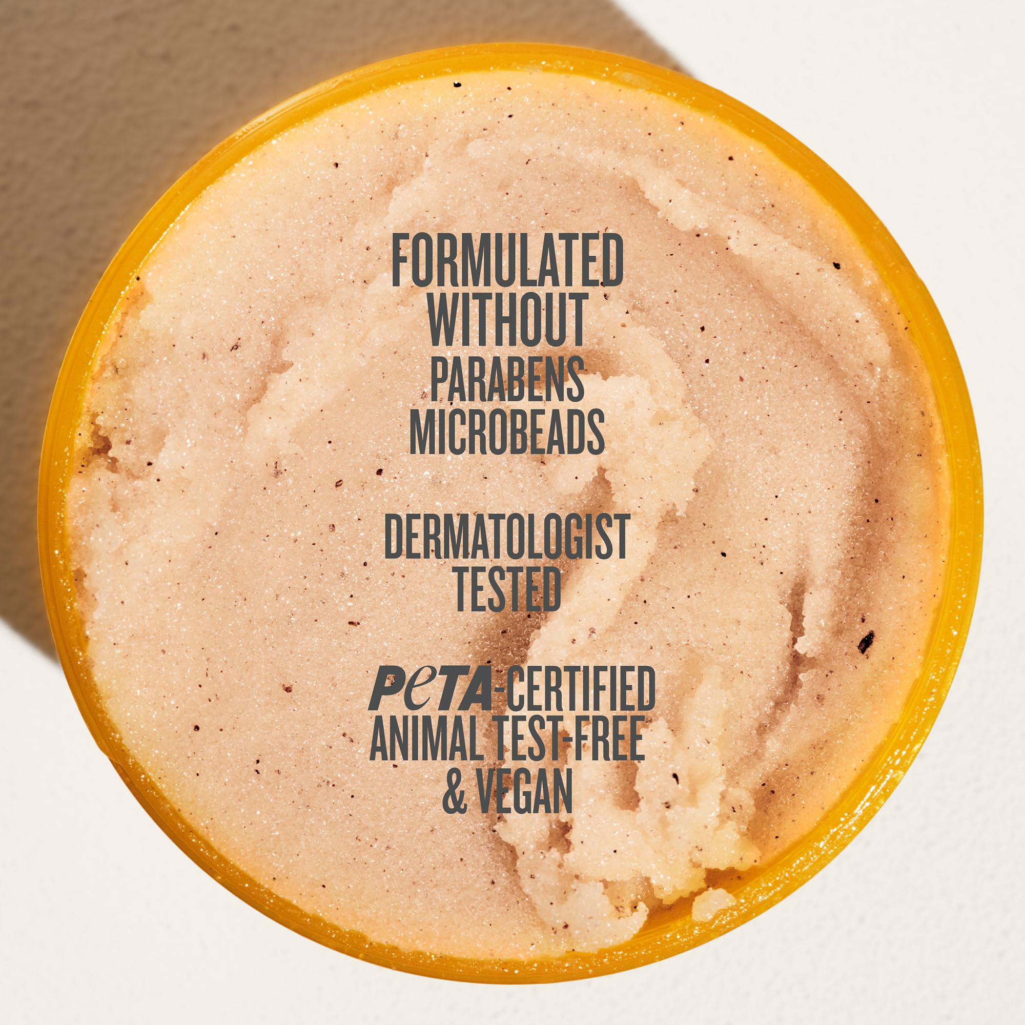 Application shot of Sol de Janeiro Bum Bum Scrub in a spa-like routine