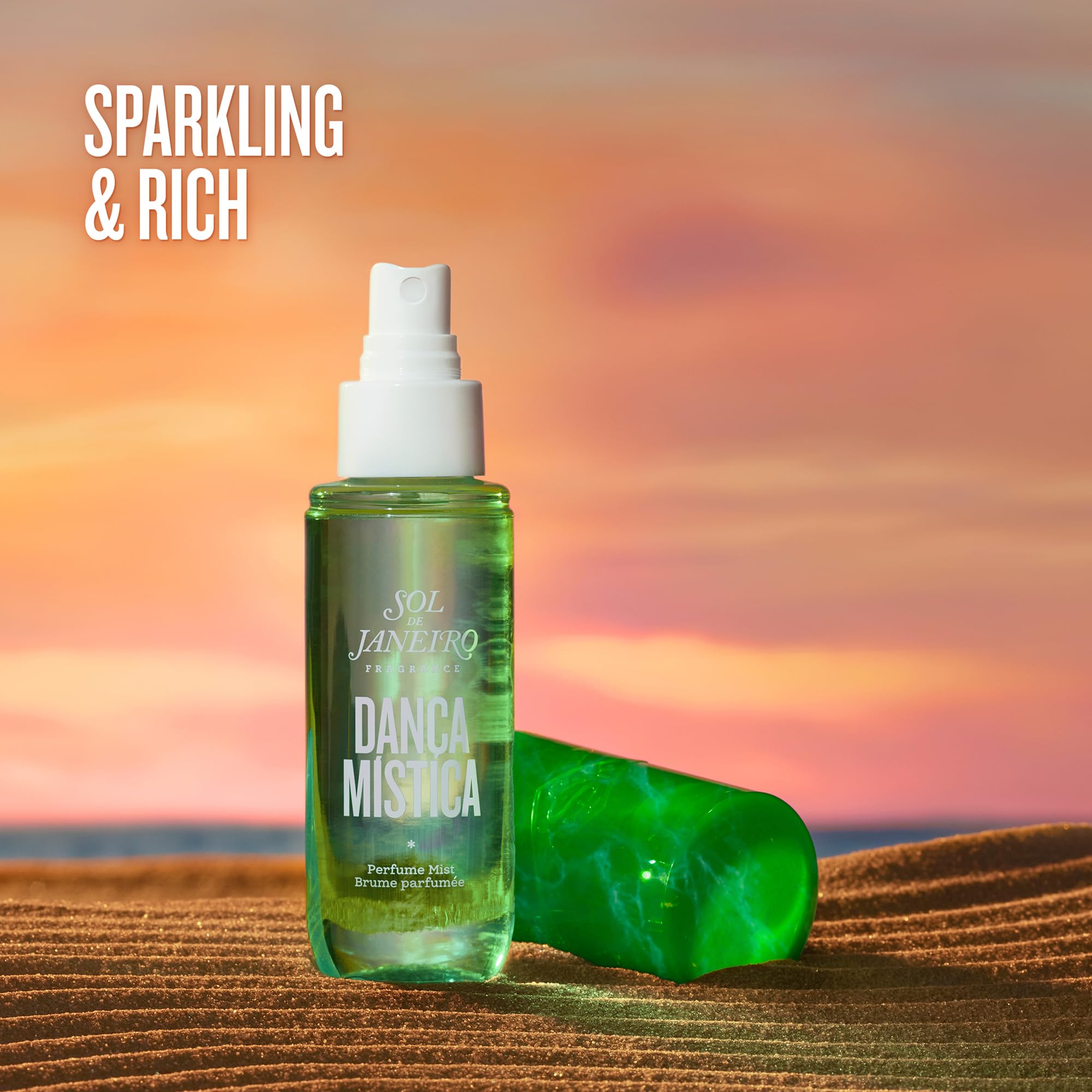 Sol de Janeiro mist bottle in hand for easy on the go refreshment.