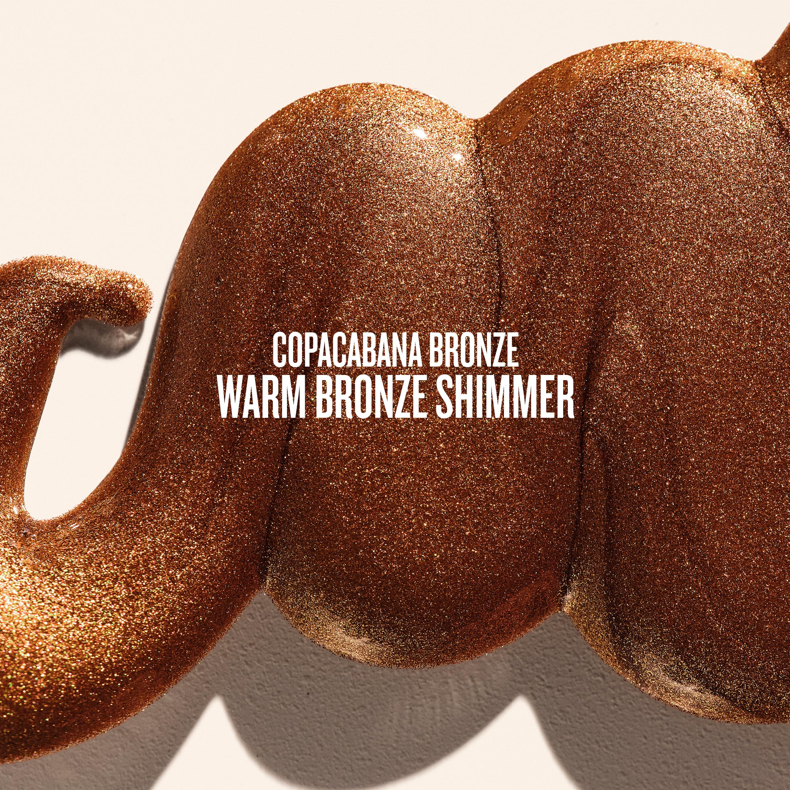 Sol de Janeiro Glowmotions glow oil application on skin for bronze shimmer.