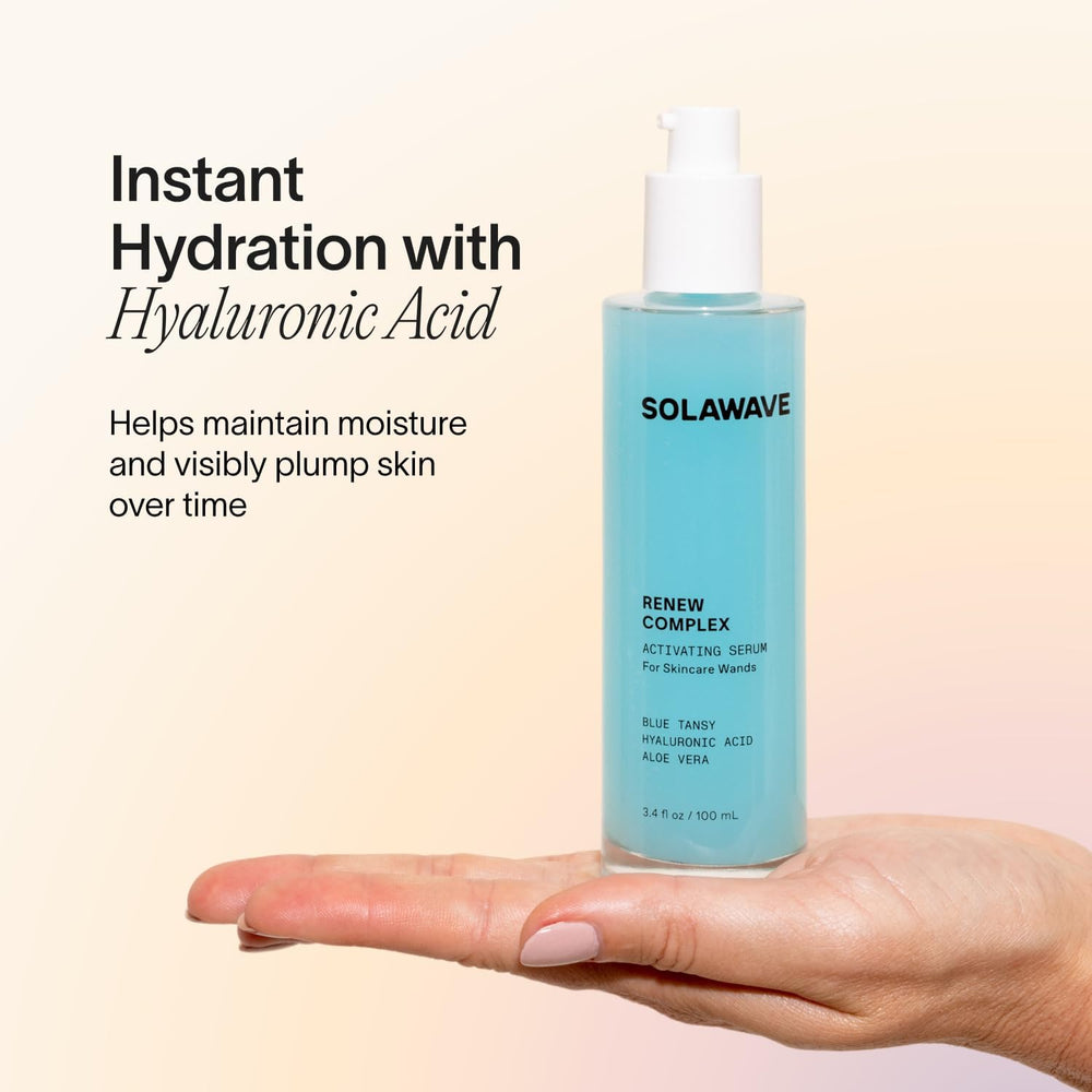 Hand applying Solawave Renew Complex to prime skin before session.