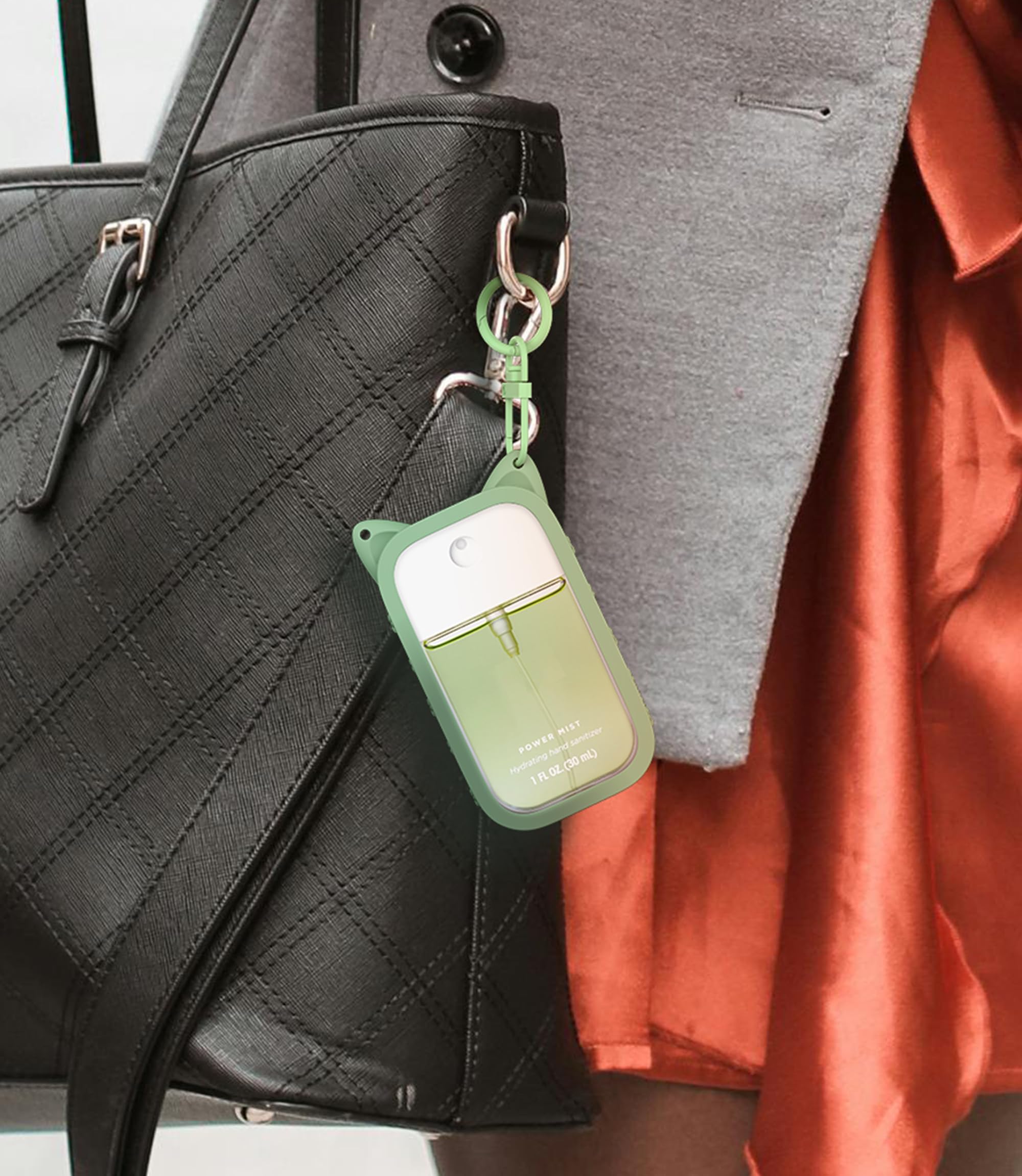 Sonnorel silicone case with gold keychain for chic portable sanitizer accessory