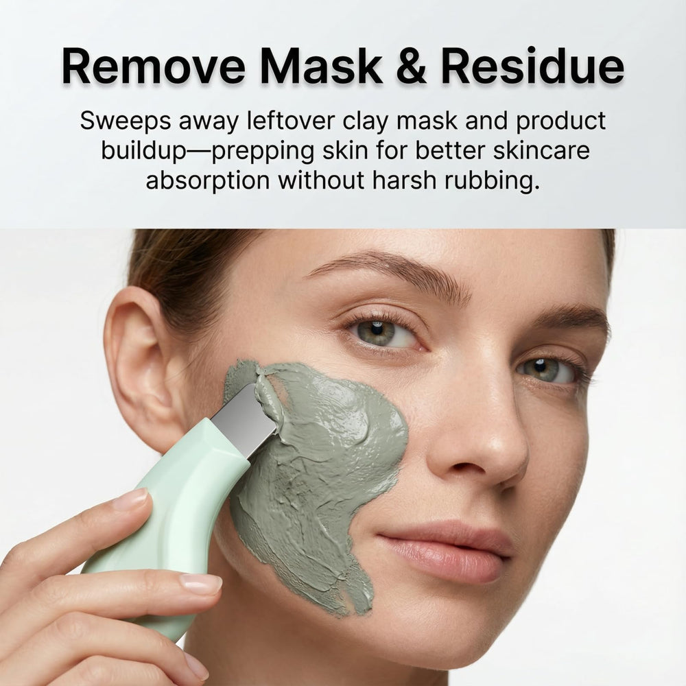 Silicone cover removed exposing stainless steel scraper for deep cleansing.