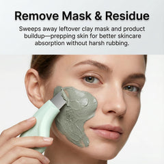Silicone cover removed exposing stainless steel scraper for deep cleansing.