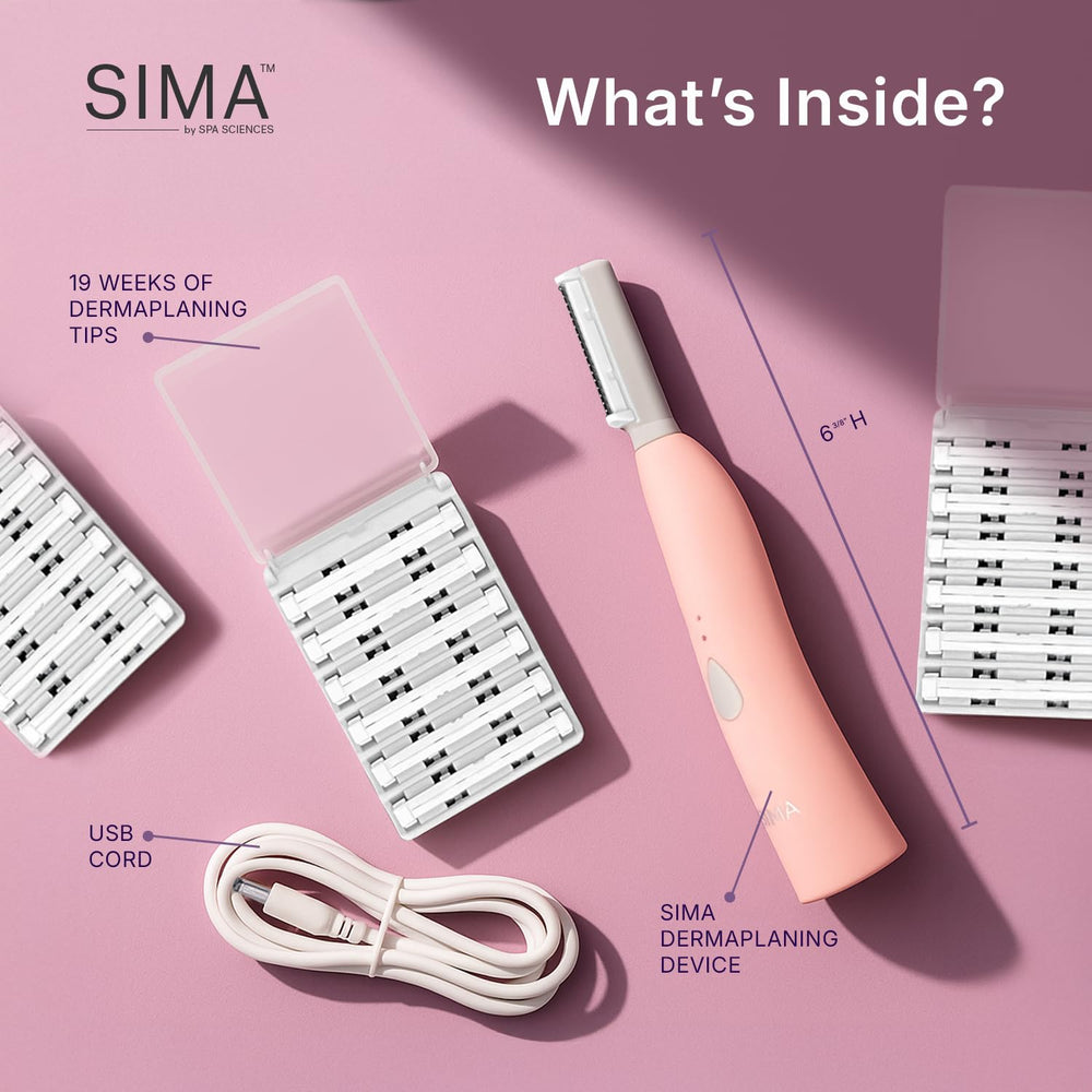 Spa Sciences SIMA dermaplaning tool in use on the cheek area for peach fuzz removal.