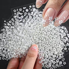 Splocudu White Flower Nail Stickers pattern closeup with petals and rhinestones.