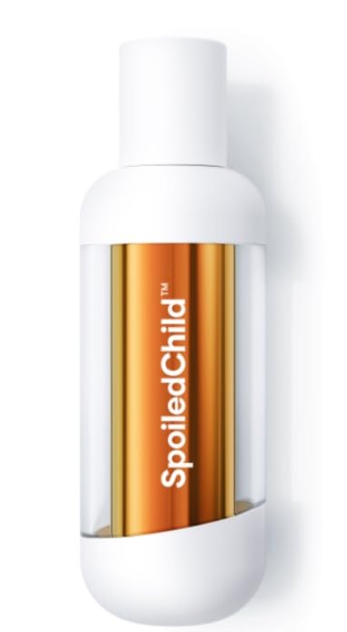 SpoiledCHILD Hair Revitalizer bottle close-up for scalp nourishment and hair fullness