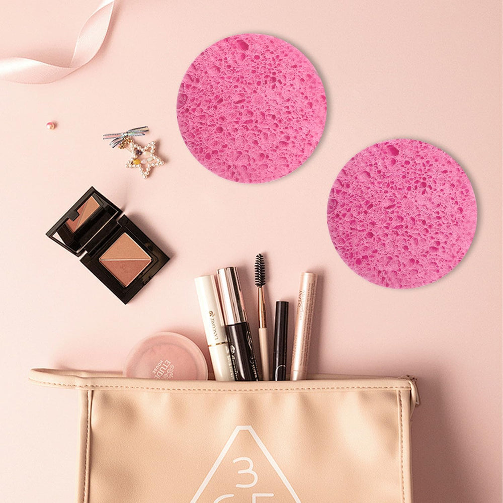 Spunspon pink round facial sponge ready for travel with compact size.