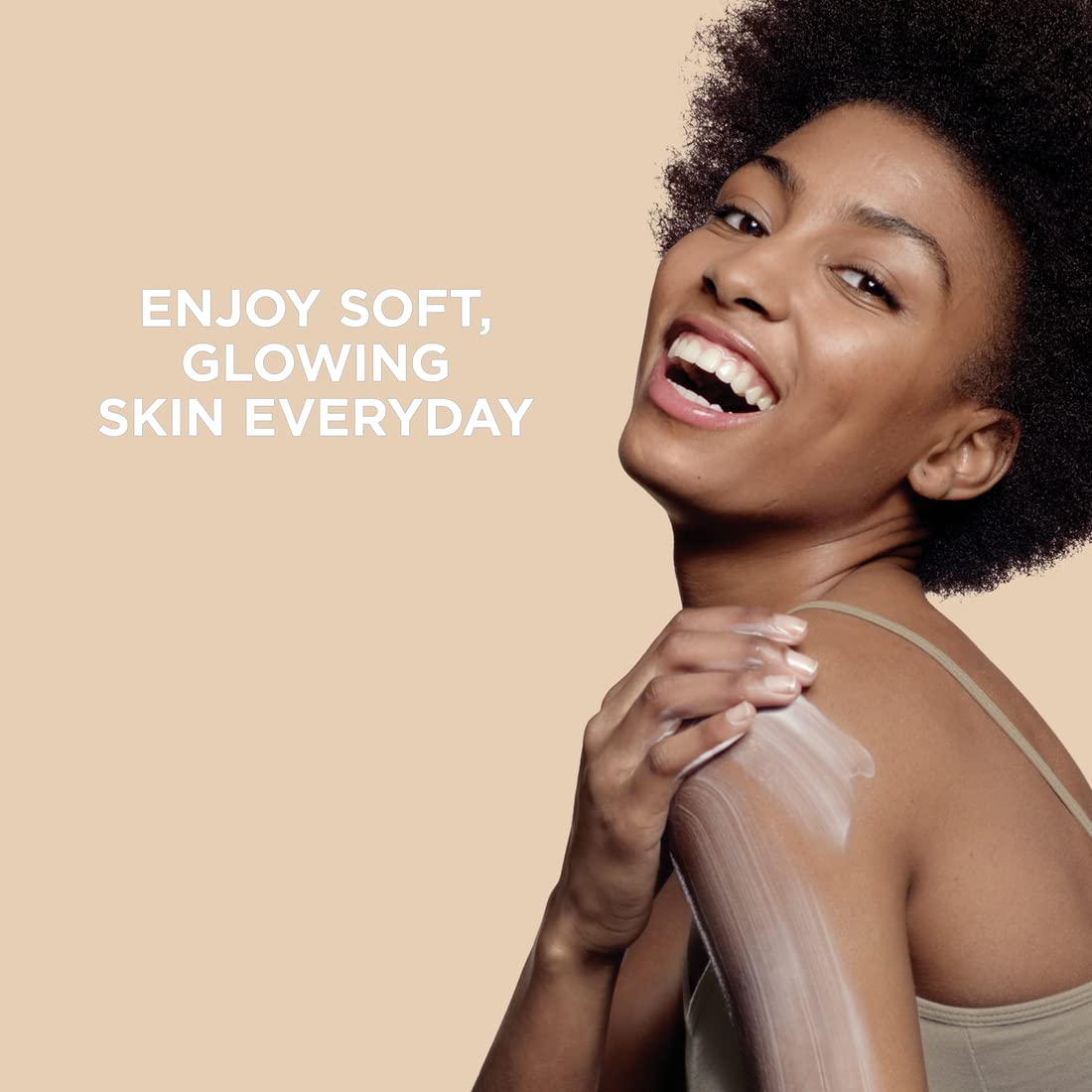 Hands applying St. Ives lotion for quick absorption and soft skin.