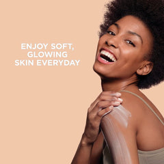 Hands applying St. Ives lotion for quick absorption and soft skin.