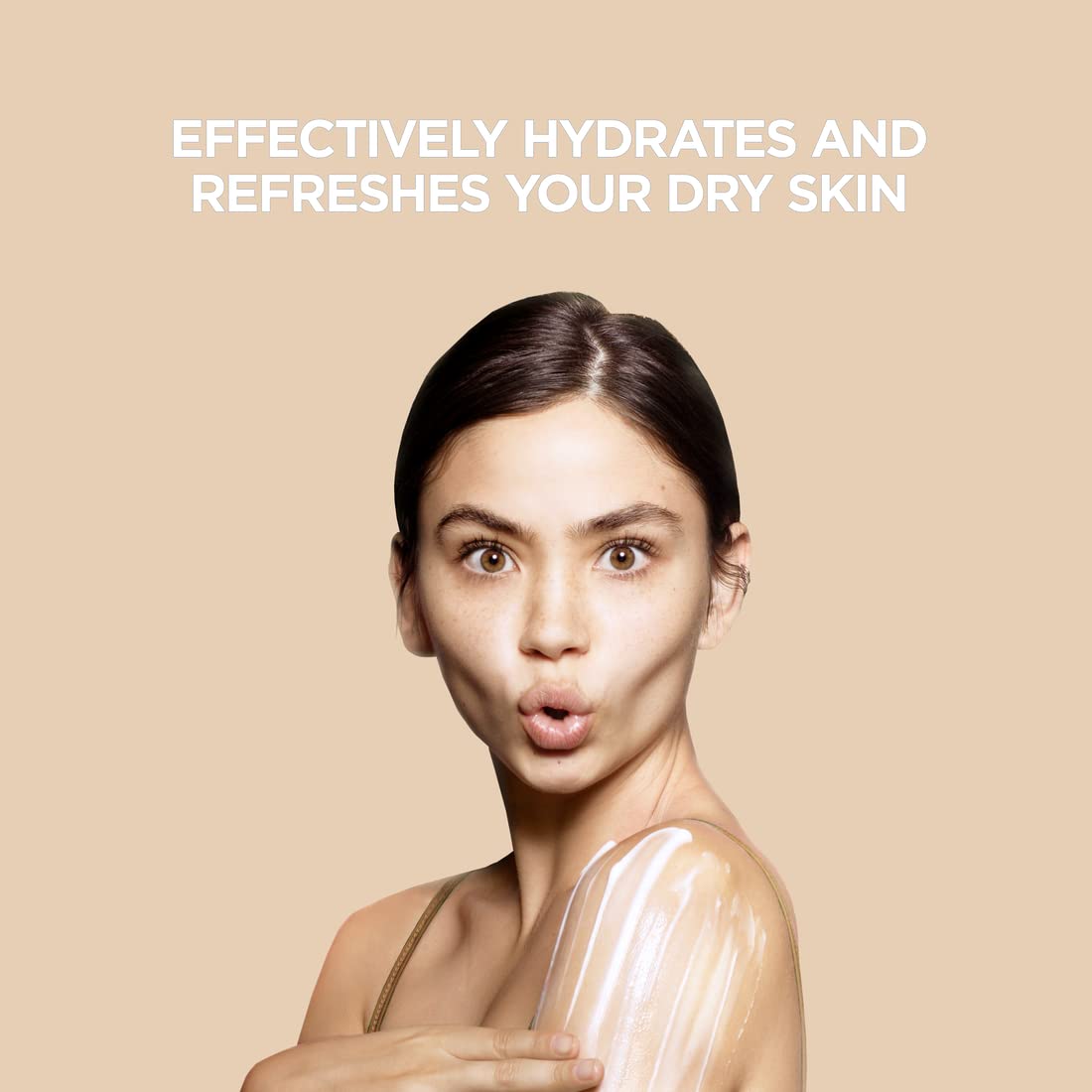 St. Ives lotion on dry skin demonstrating soothing moisture.