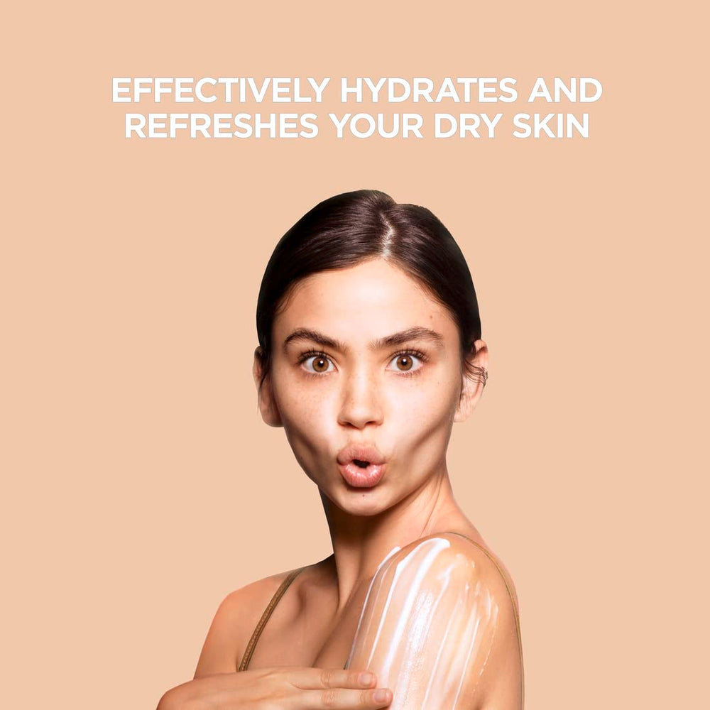 St. Ives lotion on dry skin demonstrating soothing moisture.