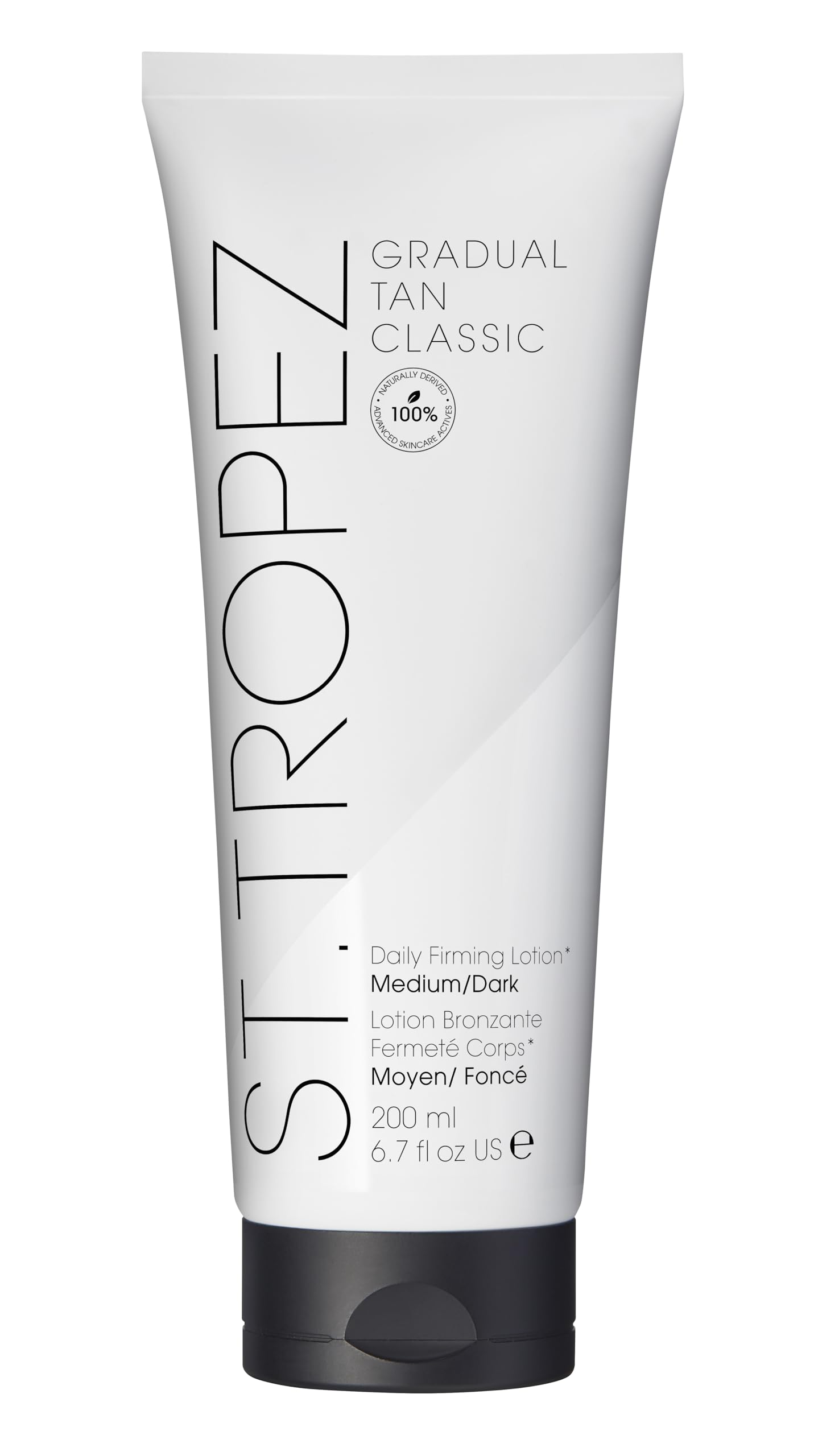 St. Tropez Gradual Tan Firming Lotion bottle shows buildable glow on skin.