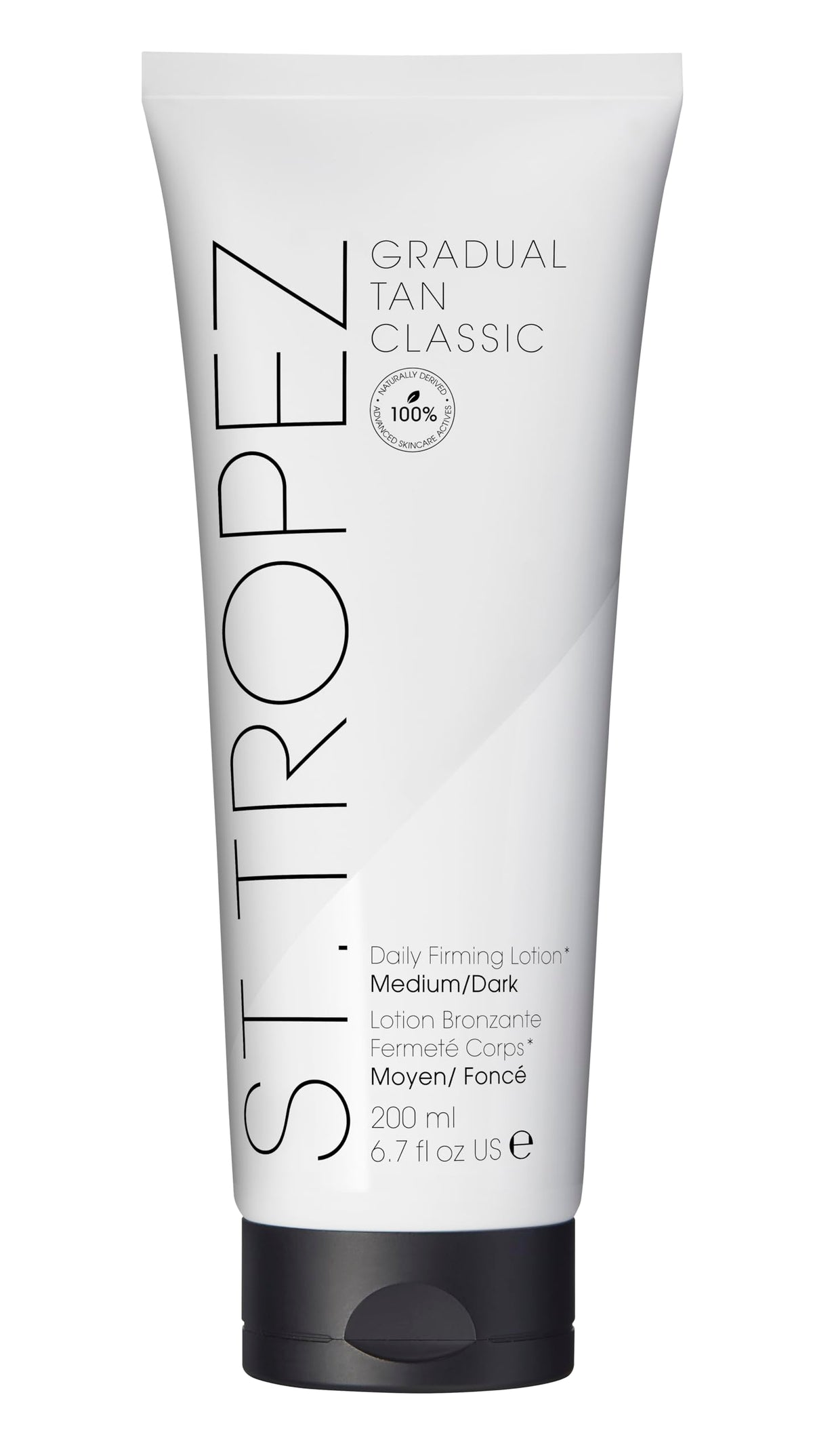 St. Tropez Gradual Tan Firming Lotion bottle shows buildable glow on skin.