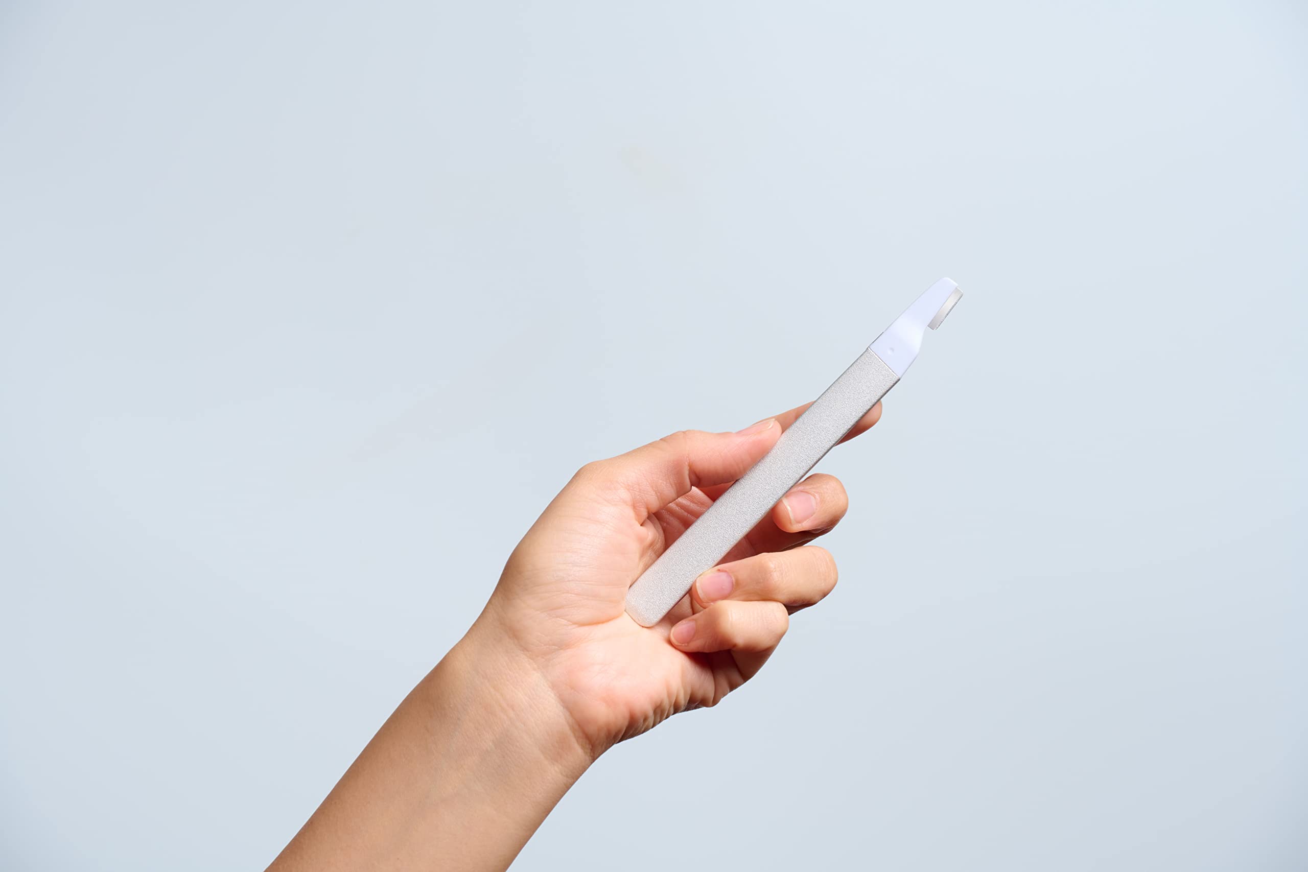 StackedSkincare precision blade for around facial contours in tight spaces.