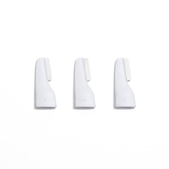 StackedSkincare mini precision dermaplaning blade focused on the nose for targeted exfoliation.