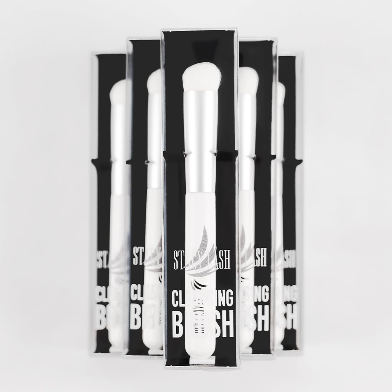 STACY LASH compact travel-friendly eyelash brush, ideal for on-the-go lash care.