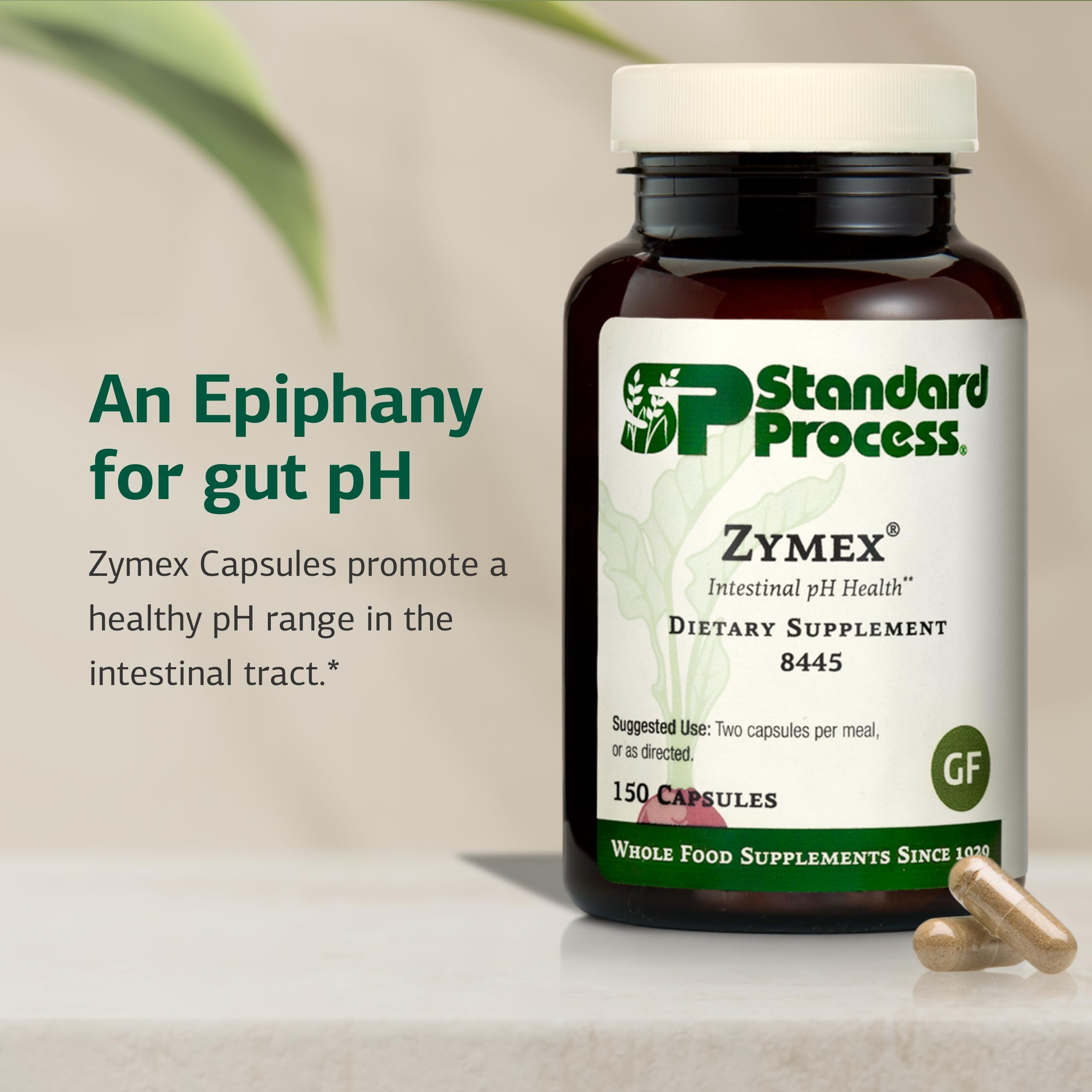 Standard Process Zymex capsules pouring into glass for daily use.