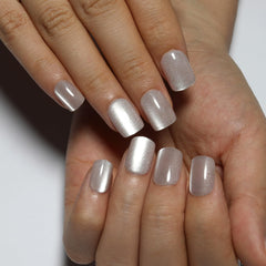 Stbisen Nude press-on nails with gel finish for a glossy, salon-like look.